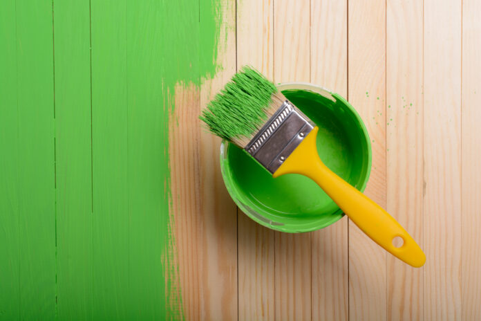 Green paint with brush